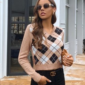 Cropped Argyle V Neck Sweater.